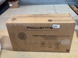 the box is sitting on the floor next to the box