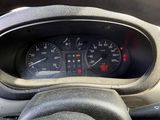a close up of a car dashboard with a speedometer