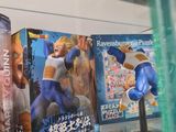 a display case with a bunch of action figures on it