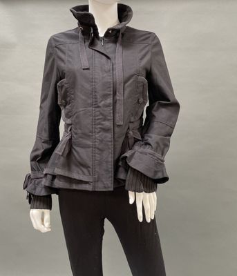 an image of a mannequin mannequin wearing a black jacket and black pants
