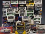 a lot of toy cars that are sitting on a table