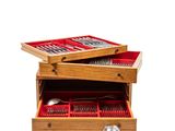 a wooden box with silverware in it and a spoon and spoon rest