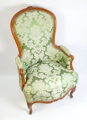 une image représentant une chaise verte et blanche sur fond blanc