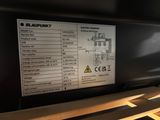 a close up of a sign on the back of a machine