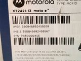 the back of a motorola cell phone with a barcode on it