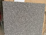 a close up of a cardboard box with a piece of paper on it