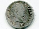 une vieille pièce d'argent avec un visage de femme dessus
