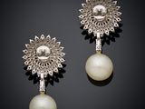 a pair of cultured pearl and diamond earrings