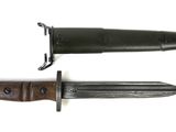 an image of a knife with a wooden handle on a white background