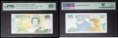 three different types of currency are on display in a display case