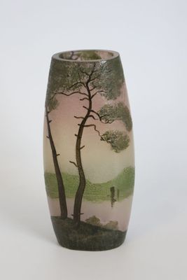 a vase that has a painting of a tree on it