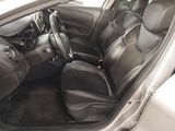 the interior of a car with black leather seats and a steering wheel