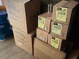 many boxes stacked on top of each other on the floor