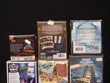 a lot of different types of video games on the table