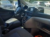 the interior of a car with a bunch of tools in it