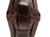 a close up of a brown and black bag on a white background