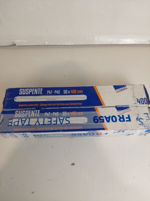 two boxes of toothpaste sitting on a counter