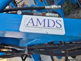un autocollant à l'arrière d'un vélo sur lequel est inscrit « amds »