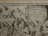 an old map of a mountain range with mountains in the background