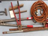 a lot of tools that are laying out on a table