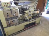 a machine that is sitting inside of a garage