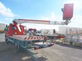 a crane that is sitting on the back of a truck