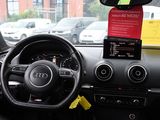 dashboard view of a car with a parking ticket on the dashboard
