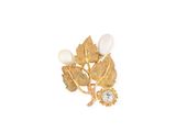 an image of a gold broochle with pearls and leaves