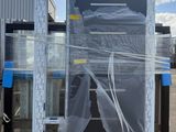 a picture of a refrigerator that is wrapped up and ready to be shipped