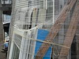 a pile of windows that have been placed on a pallet