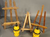 a wooden easel with a yellow object next to it