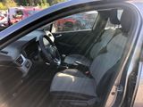 the interior of a car with the driver ' s seat folded down
