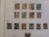 an open book with a bunch of different stamps on it