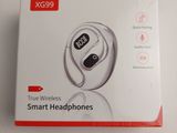 the box of a pair of headphones is open on a white surface