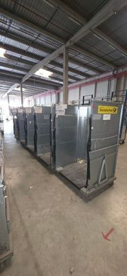 a large warehouse filled with lots of metal containers