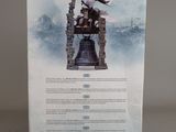 a box with a picture of the witch on top of a bell