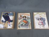 Trois livres pour enfants sont alignés sur une table
