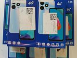 three boxes of new and unused cell phones sitting on top of a table