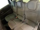 two seats in the back of a car that are empty