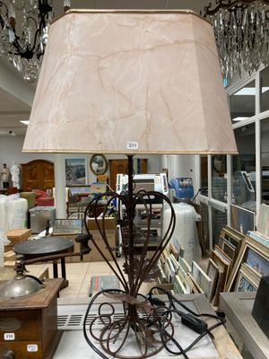 a lamp that is sitting on a table in a room