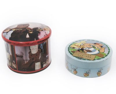 two tins that are sitting next to each other