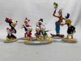 five figurines of donald duck, goofy duck, goofy duck, goofy duck, goofy duck, goofy duck and goofy duck