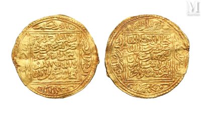 two gold coins with arabic writing on them