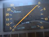 a close up of a speedometer on a vehicle