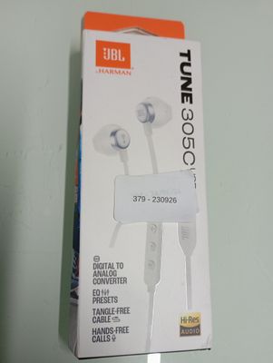 the box of a pair of headphones is sitting on the table