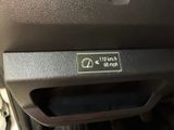 a close up of a car door handle with a sticker on it