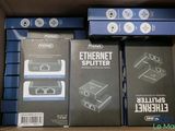several boxes of electronic devices are stacked on top of each other