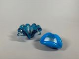 pair of blue glass figurines of a fish and a shell