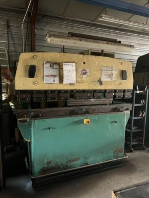 an image of a machine that is in a garage