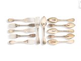 a lot of forks and spoons on the table